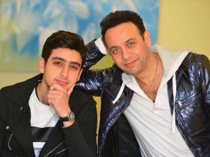 Click to enlarge image tiam amar with father.jpg
